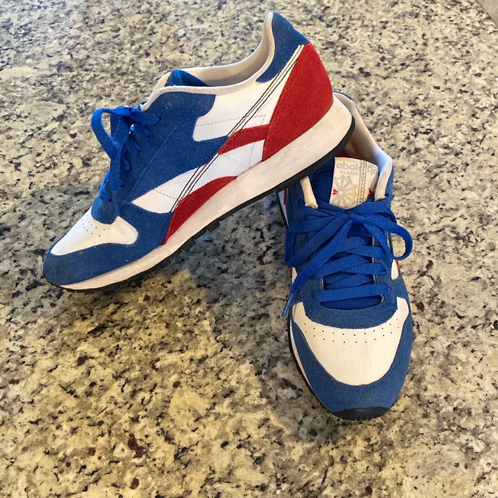 Reebok Classic Leather Blue/Red/White Shoe. These are a men’s 8. Women’s 9.5.